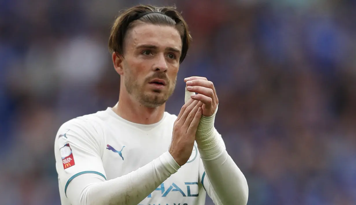 Jack Grealish. Kepindahan gelandang serang Aston Villa ke Manchester City pada 5 Agustus 2021 lalu menjadi rekor sementara di Liga Inggris musim ini. Ia ditebus dengan nilai 117,5 juta euro. Rekor ini masih bisa dipatahkan Harry Kane jika bergabung dengan The Citizens. (Foto: AFP/Adrian Dennis)