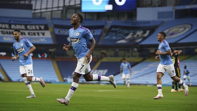 Winger Manchester City, Raheem Sterling merayakan golnya ke gawang Arsenal