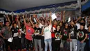 Puluhan slankers Indonesia mendukung revolusi mental yang diusung Jokowi-JK di markas Slank, Jakarta, Kamis (26/6/14). (Liputan6.com/Miftahul Hayat)