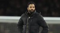 Ekspresi kecewa pelatih Manchester United, Ruben Amorim setelah laga lanjutan Liga Inggris 2024/2025 melawan Arsenal di Emirates Stadium, London, Inggris, Kamis (05/12/2024) WIB. (AP Photo/Kirsty Wigglesworth)