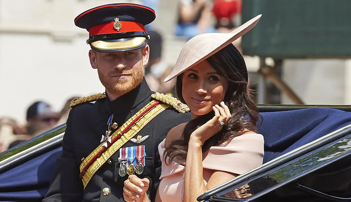 Meghan Markle dan Pangeran Harry akan pergi ke Australia pada bulan oktober dalam peluncuran Invictus Games. (Niklas HALLEN / AFP)