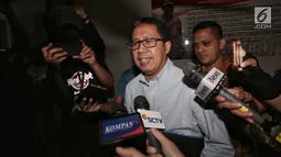 Plt Ketum PSSI Joko Driyono memenuhi panggilan Satgas Anti-Mafia Bola Polri di Mapolda Metro Jaya, Jakarta, Rabu (27/2). Jokdri diperiksa sebagai tersangka perusakan barang bukti pengaturan skor sepakbola Indonesia. (Liputan6.com/Johan Tallo)