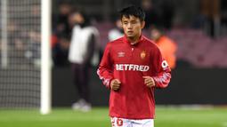 2. Takefusa Kubo (Villarreal) - Pemain asal Jepang ini dipinjamkan Real Madrid ke Villareal untuk terus mengasah kemampuannya. Takefusa Kubo mempunyai bakat luar biasa, ia pemain yang lincah dalam memberikan assist. (AFP/Josep Lago)