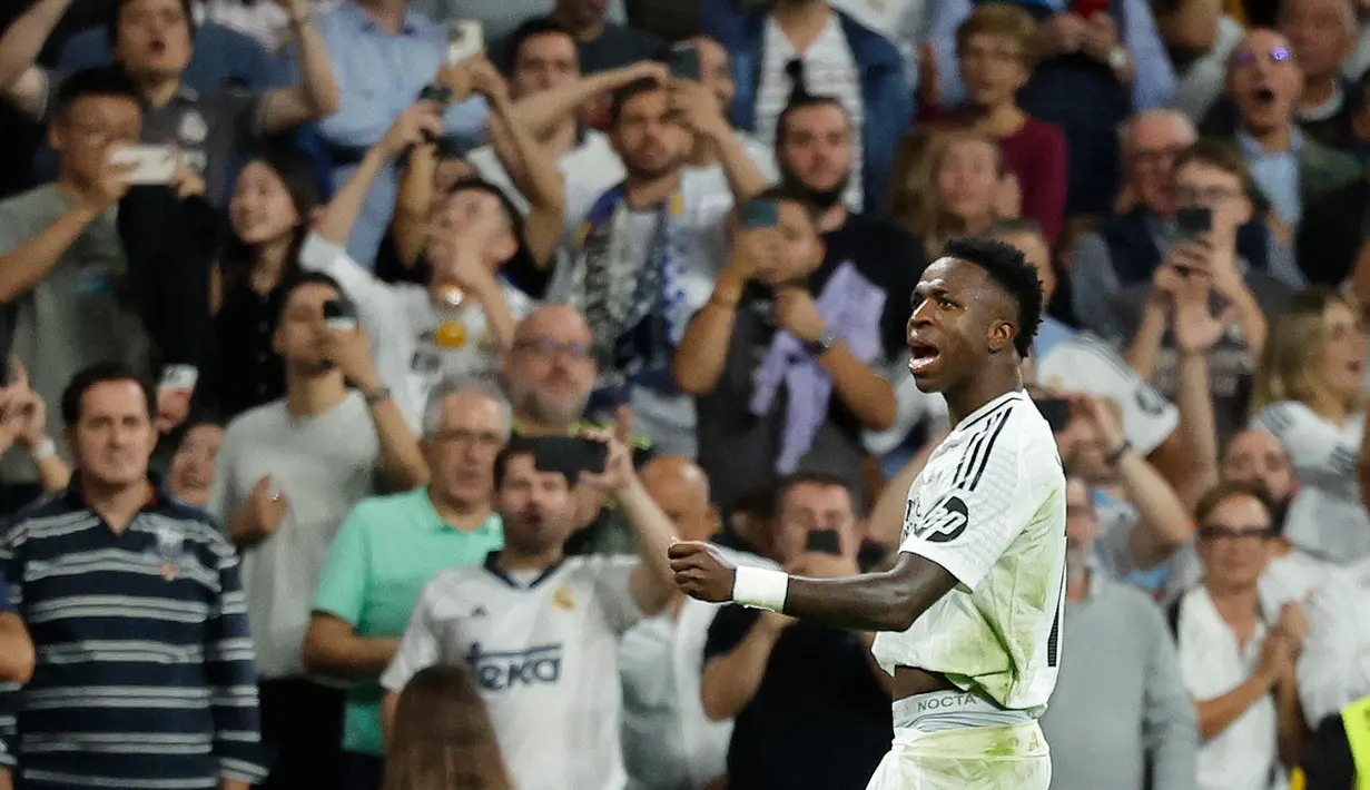 Di babak kedua, pada menit ke-73, Vinicius Junior berhasil menggandakan keunggulan Real Madrid atas Villarreal. (OSCAR DEL POZO/AFP)