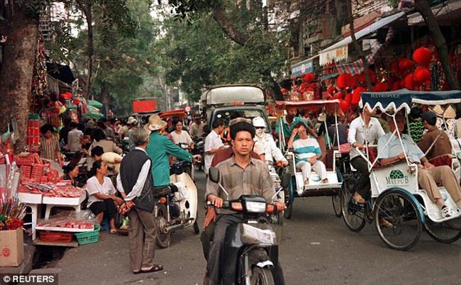 Suasana sehari-hari penduduk di Vietnam | Photo: Copyright dailymail.co.uk