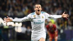 Gareth Bale. Pemain sayap Wales berusia 32 tahun yang telah berseragam Real Madrid selama 8 musim sejak 2013/2014 ini telah mencetak 16 gol di Liga Champions bersama Los Blancos. Jumlah gol tersebut dicetaknya dari total 56 laga. (AFP/Franck Fife)