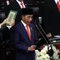 Joko Widodo atau Jokowi membacakan sumpah jabatan saat dilantik menjadi Presiden RI periode 2019-2024 di Gedung Nusantara, Jakarta, Minggu (20/10/2019).  Jokowi dan Ma'ruf Amin resmi dilantik sebagai Presiden dan Wakil Presiden RI periode 2019-2024. (Liputan6.com/JohanTallo)