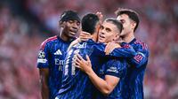 Arsenal berhasil meraih kemenangan atas Athletic Bilbao 2-0 pada matchday pembuka fase liga Liga Champions 2025/2026 di San Mames Stadium pada Selasa, 16 September 2025. Kemenangan ini tak lepas dari aksi kompak Gabriel Martinelli dan Leandro Trossard yang saling menyumbang gol dan assist. (AP Photo/Miguel Oses)