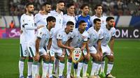 Para pemain Timnas Irak berpose untuk foto tim sebelum pertandingan kualifikasi Piala Dunia FIFA 2026 zona Asia antara Korea Selatan dan Irak di Yongin pada 15 Oktober 2024. (JUNG YEON-JE/AFP)