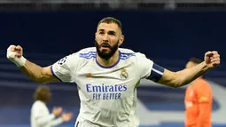 Karim Benzema. Striker yang telah 13 musim memperkuat Real Madrid ini total telah membuat 16 kali braces dalam 133 laga di Liga Champions bersama Olympique Lyon dan Real Madrid. Braces teranyarnya dibuat saat Los Blancos mengalahkan Shakhtar Donetsk 2-1, 3 November 2021. (AFP/Pierre-Philippe Marcou)