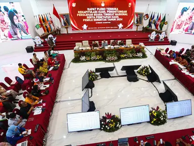Suasana rapat pleno terbuka penghitungan suara nasional Pemilu 2024 yang digelar di gedung Komisi Pemilihan Umum (KPU) Republik Indonesia, Jakarta, Selasa (19/3/2024). (Liputan6.com/Angga Yuniar)