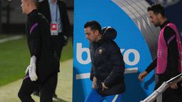 Pelatih Barcelona Xavi dan gelandang Spanyol Barcelona Sergio Busquets tiba untuk sesi latihan di stadion Camp Nou di Barcelona, Spanyol (22/11/2021). Barcelona akan bertanding melawan Benfica pada Grup E Liga Champions di Camp Nou. (AFP/Gen Lluis)