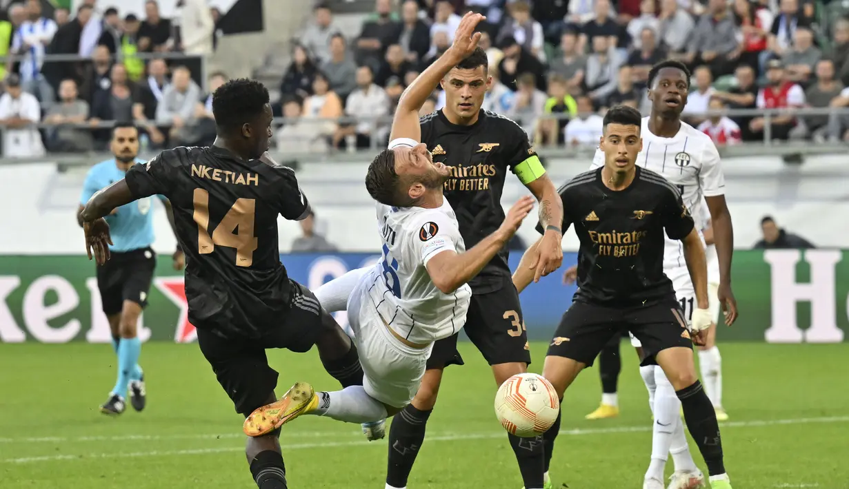Pasukan Mikel Arteta tampil spartan dan memenangkan laga dengan skor 2-1. (Gian Ehrenzeller/Keystone via AP)