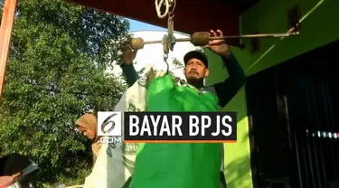 Warga Desa Socorejo, Kecamatan Jenu, Kabupaten Tuban, Jawa Timur membayar premi BPJS Kesehatan dari hasil menabung sampah.