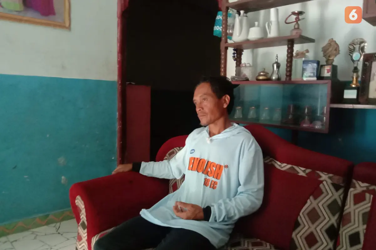 Sugimin suami LW pekerja migran Indonesia asal Banyuwangi. (Hermawan Arifianto/Liputan6.com)