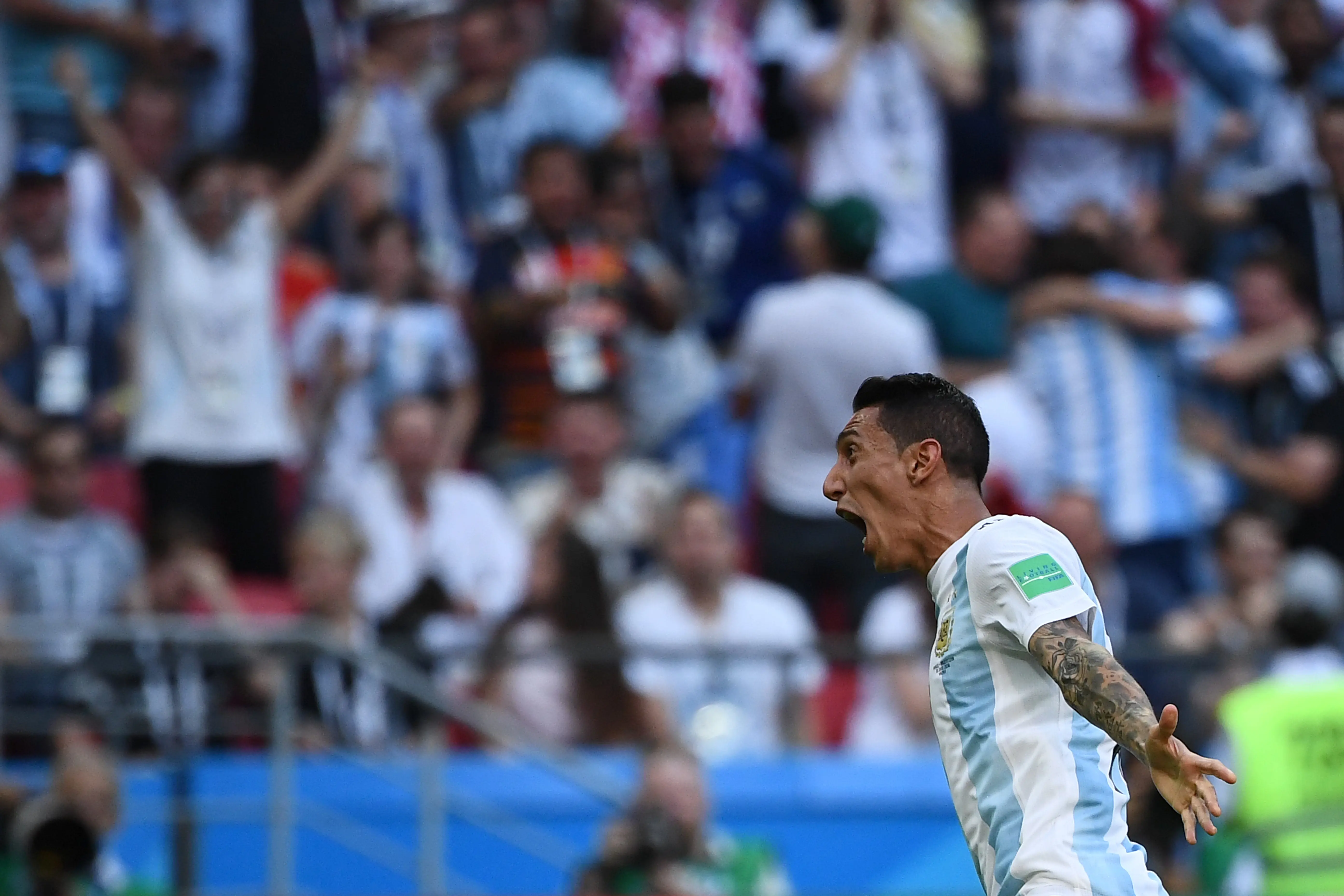 Pemain Timnas Argentina, Angel Di Maria, melakukan selebrasi setelah mencetak gol ke gawang Prancis, pada Babak 16 Besar Piala Dunia 2018, di Kazan Arena, Sabtu (30/6/2018) malam WIB.  (AFP/Luis Acosta)