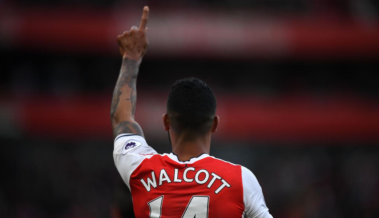 Theo Walcott pertama kali bermain untuk Arsenal pada tahun 2006 setelah didatangkan dari Southampton. (AFP/Justin Tallis)