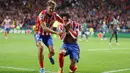 Gol kemenangan Atletico Madrid baru tercipta saat laga memasuki masa tambahan waktu. Pada menit ke-90, Jose Gimenez berhasil mencetak gol memanfaatkan umpan dari Antoine Griezmann. (Thomas COEX/AFP)