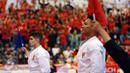 Ahmad Zigi Zaresta tersenyum usai memastikan kemenangan di final Junior Kata Male di WKF World Junior, Cadet and U-21 Championship 2015 di ICE Serpong, Kamis (12/11/2015). Zigi menyumbang emas pertama bagi Indonesia. (Liputan6.com/Helmi Fithriansyah)