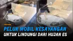 Nampak pria itu mondar-mandir sambil menyandarkan badannya ke mobil dan merentangkan tangannya.