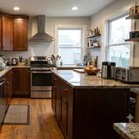Ilustrasi Dapur dengan Dua Kitchen Island/AI Generated