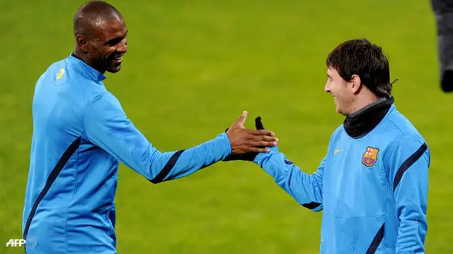 eric-abidal-messi-130307-logo.jpg