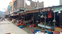 Aktivitas jual-beli di Pasar Tradisional Manonda, Kota Palu. Dinas Perdagangan dan Perindustrian Kota Palu menyebut selama pandami inflasi di daerah itu masih terkendali. (Foto: Heri Susanto/ Liputan6.com).