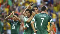 Reaksi timnas Meksiko setelah dikalahkan Belanda 1-2 dalam babak 16 Piala Dunia 2014. (REUTERS / Murad Sezer)