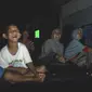 Panitia Festival Film Purbalingga mencari warga yang bersedia membuka rumahnya untuk nonton bareng dengan tetangganya. (Liputan6.com/Gun ES)