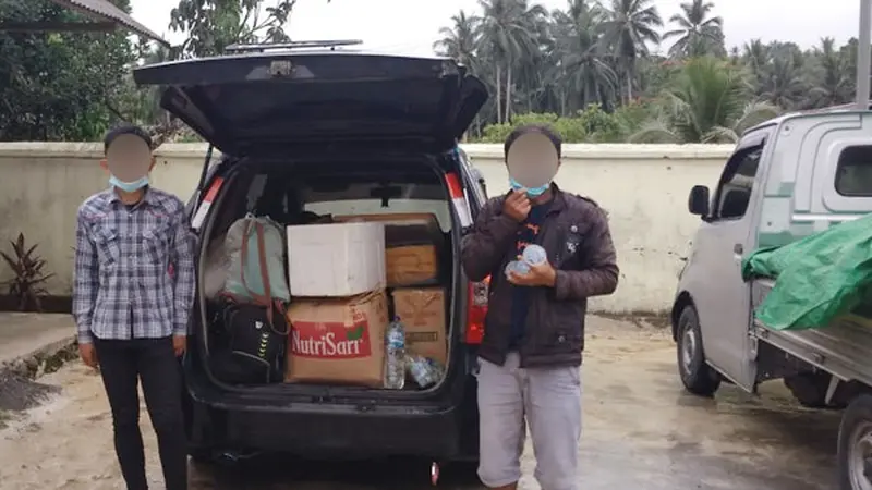Pelaku dan barang bukti berupa ratusan liter miras jenis Cap Tikus diamankan Polres Bolmong.