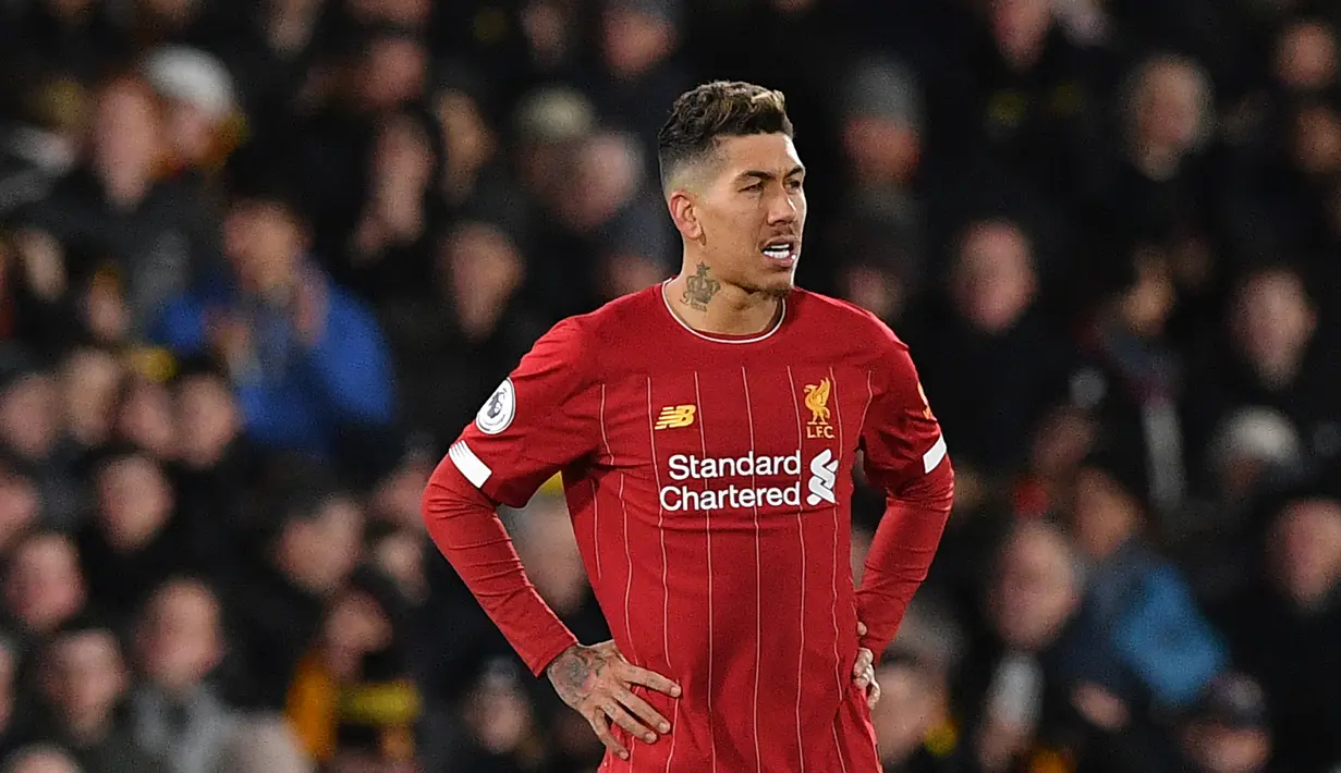 Roberto Firmino - Kepiawaian Firmino dalam membaca permainan membuat dirinya menjadi sangat penting bagi lini depan Liverpool. Firmino berkontribusi empat gol dan satu assist untuk skuat The Reds di Liga Champions musim lalu. (AFP/Justin Tallis)