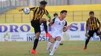 Duel Malaysia vs Brunei di penyisihan Grup B Piala AFF U-19 2018 di Stadion Gelora Joko Samudro, Gresik, Jumat (6/7/2018). (Bola.com/Zaidan Nazarul)