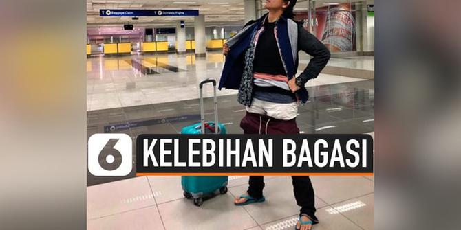 VIDEO: Perempuan Ini Pakai Baju Bertumpuk Agar Tak Kelebihan Bagasi