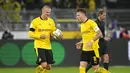 Gelandang Borussia Dortmund, Marco Reus (kanan) berselebrasi usai mencetak gol ke gawang Bayern Munchen pada pertandingan final final Piala Super Jerman di Signal Iduna Park, Jerman, Rabu (18/8/2021). Munchen menang atas Dortmund dengan skor 3-1. (AP Photo/Martin Meissner)
