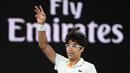 Petenis Korea Selatan, Hyeon Chung merayakan kemenangan atas petenis Serbia, Novak Djokovic pada ajang Australia Terbuka 2018 di Melbourne,  (22/2/2018). Djokovic kalah 6-7, 5-7, 6-7. (AFP/Saeed Khan)