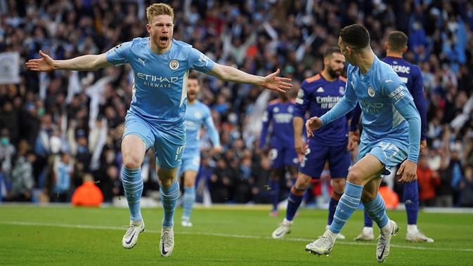<p>Manchester City meraih kemenangan 4-3 atas Real Madrid pada laga leg pertama semifinal Liga Champions di Stadion Etihad, Rabu (27/4/2022) dini hari WIB. (AP Photo/Jon Super)</p>