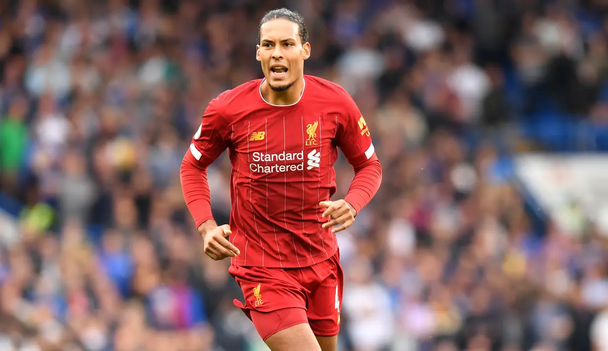 Virgil van Dijk - Bergabung dengan Liverpool pada Januari 2018, van Dijk langsung memberikan kontribusi yang sangat besar bagi lini pertahanan The Reds. Pemain asal Belanda ini menjadi tembok pertahanan yang kokoh Liverpool. (AFP/Olly Greenwood)