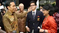 Hadiri Wisuda anak, Jokowi dan Iriana kenakan pakaian khas Indonesia (Foto: http://www.straitstimes.com/)