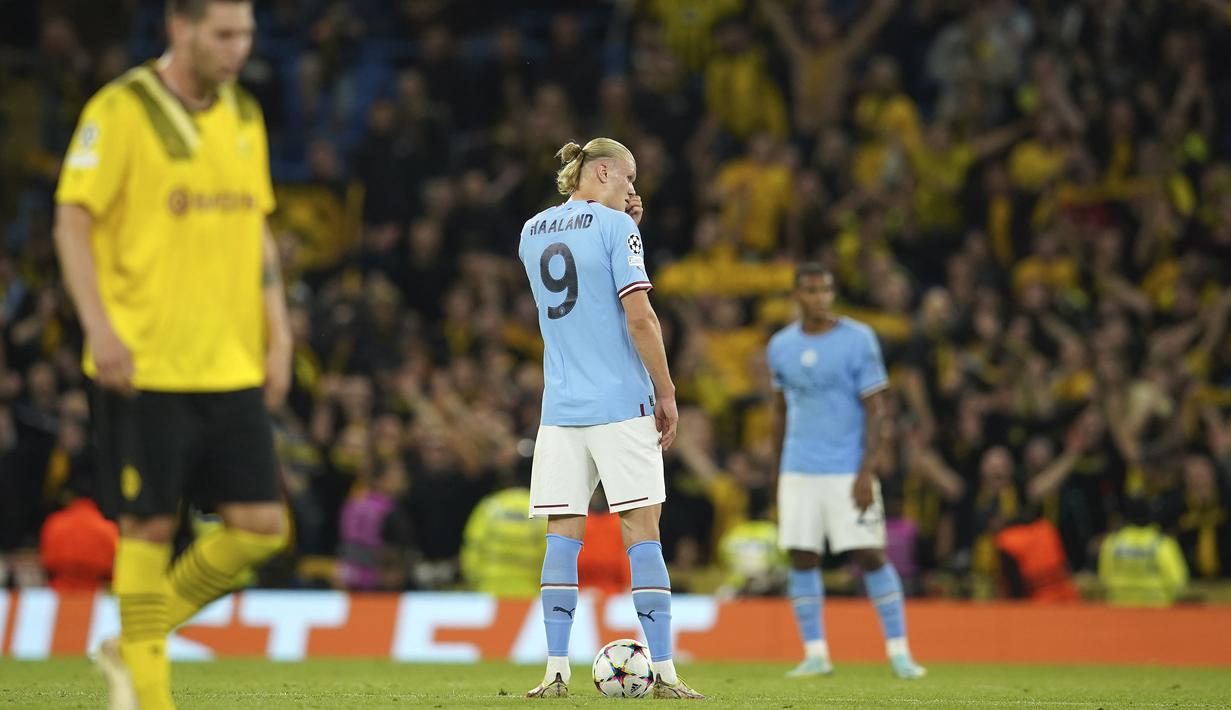 Manchester City pun malah tertinggal duluan usai kebobolan pada menit ke-56 lewat gol Jude Bellingham. (AP/Dave Thompson)