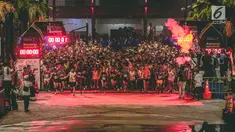 Ribuan pelari mengikuti Jakarta Marathon 2018 di Gelora Bung Karno, Jakarta, Minggu (28/10). Sebanyak 12.500 pelari meramaikan Jakarta Marathon 2018, Memasuki tahun keenam, Jakarta Marathon yang di sponsori oleh PLN. (Liputan6.com/Faizal Fanani)