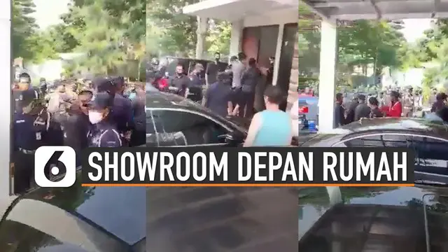 Beredar video warga perumahan buat showroom mobil di depan rumahnya. Kejadian itu membuat beberapa satpam mendatangi pemilik rumah tersebut.