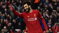Rekan satu tim Sadio Mane, Mohamed Salah merupakan kreator gol bagi Liverpool musim lalu. Pemain berkebangsaan Mesir ini telah membukukan 31 gol dan enam assist dari 51 penampilannya di semua ajang. Peringkat tiga besar The Reds di Liga Inggris juga tak lepas dari jasanya. (Foto: AFP/Paul Ellis)