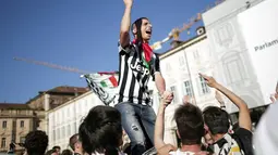 Juventus berhak menggenggam gelar scudetto 2013-2014 setelah berhasil mengumpulkan 93 poin dari 35 pertandingan di Liga Italia Seri A, (4/5/2014). (AFP/Marco Bertorello)