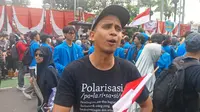 Andovi Da Lopez saat melakukan aksi demonstrasi di Gedung DPR/MPR