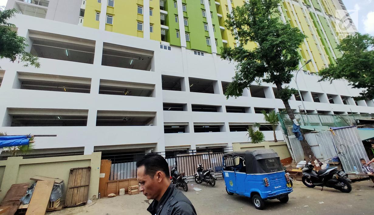 Suasana proyek Rusunawa Pasar Rumput yang hampir selesai pengerjaannya di Jakarta, Selasa (16/7/2019). Rusunawa Pasar Rumput akan diresmikan oleh Presiden Joko Widodo atau Jokowi pada Agustus mendatang. (Liputan6.com/Immanuel Antonius)