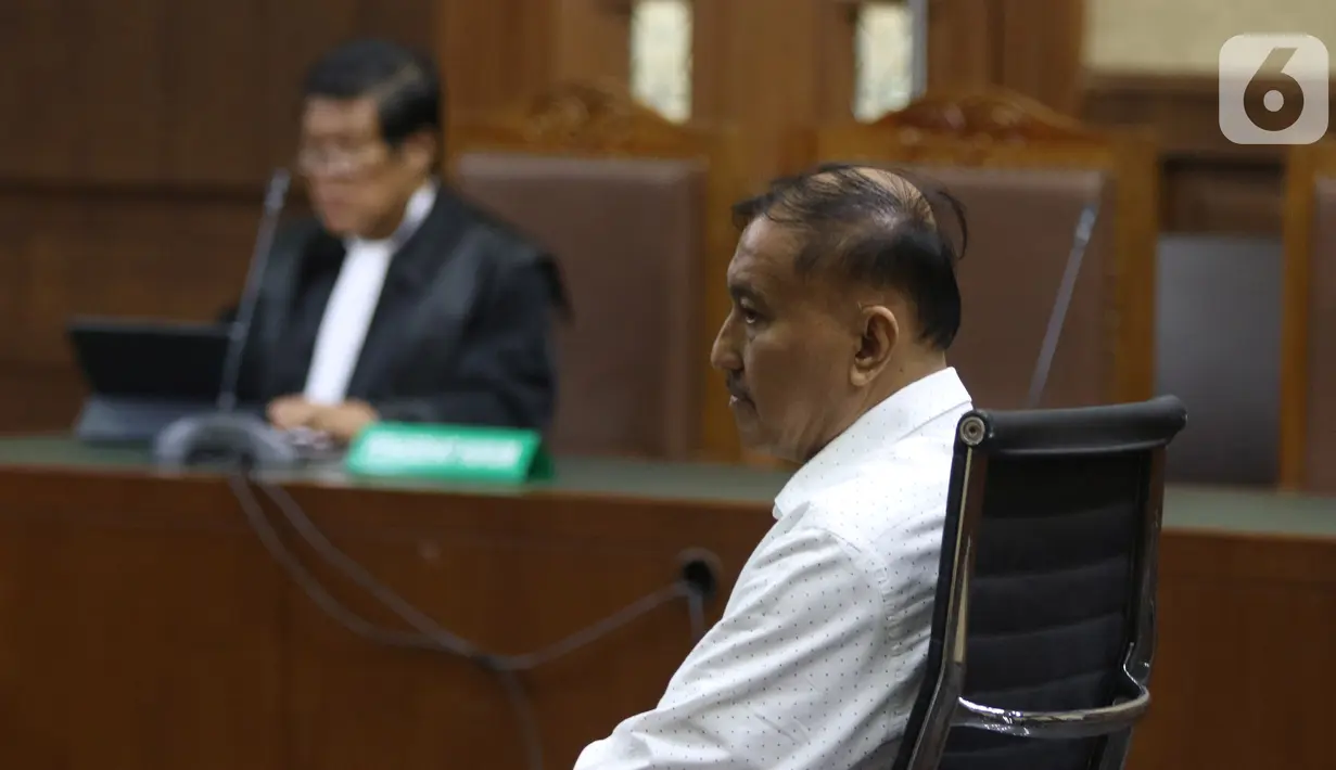 Terdakwa kasus korupsi proyek KTP Elektronik Markus Nari menjalani sidang lanjutan di Pengadilan Tipikor, Jakarta, Senin (28/10/2019). Sidang tersebut beragenda tuntutan dari JPU, Markus Nari dituntut 9 tahun dan denda Rp 900 juta. (Liputan6.com/Herman Zakharia)