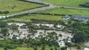 Hujan deras, yang diperkuat oleh pola cuaca El Nino, telah melanda negara Afrika Timur ini selama berminggu-minggu. (AP Photo/Bobby Neptune)