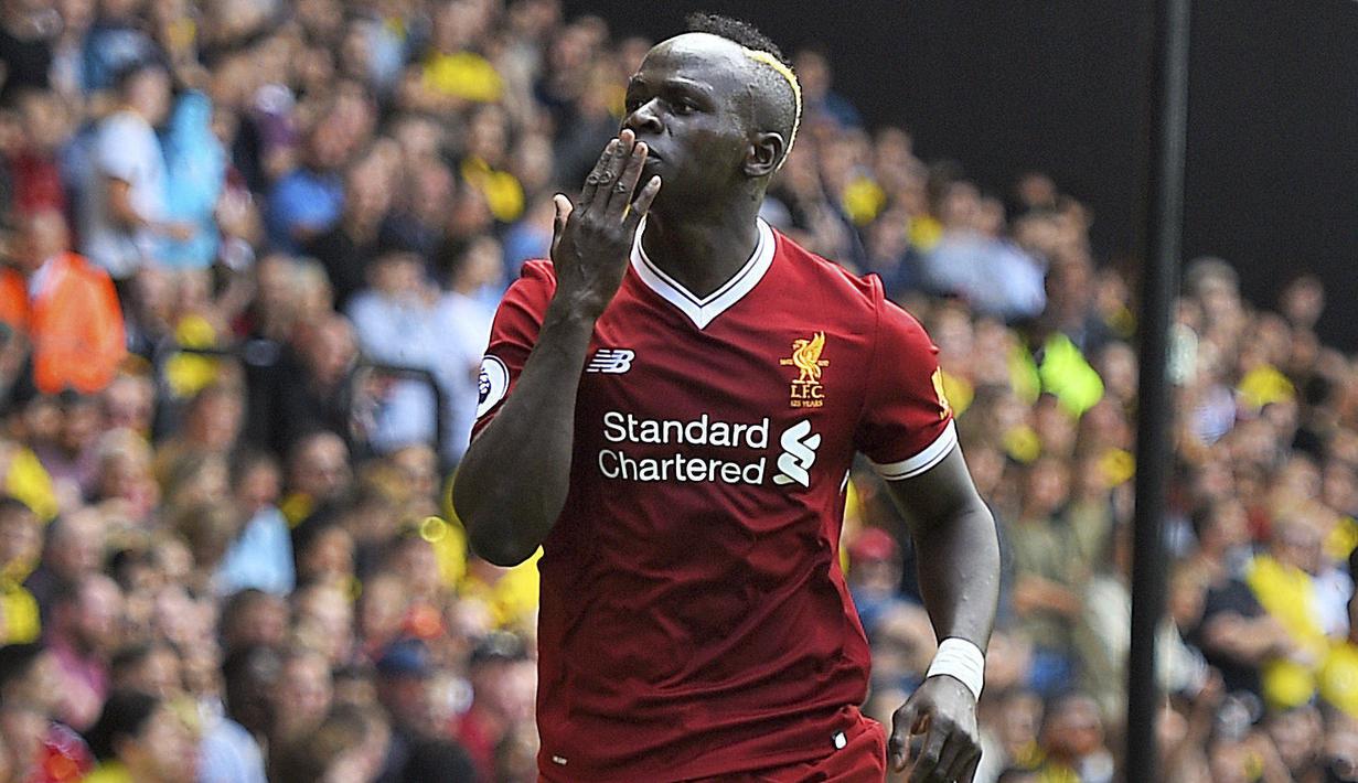 Selebrasi pemain Liverpool, Sadio Mane saat mencetak gol ke gawang Watford pada laga Premier League di Vicarage Road, Watford, (12/8/2017). Liverpool bermain imbang 3-3. (Daniel Hambury/PA via AP)