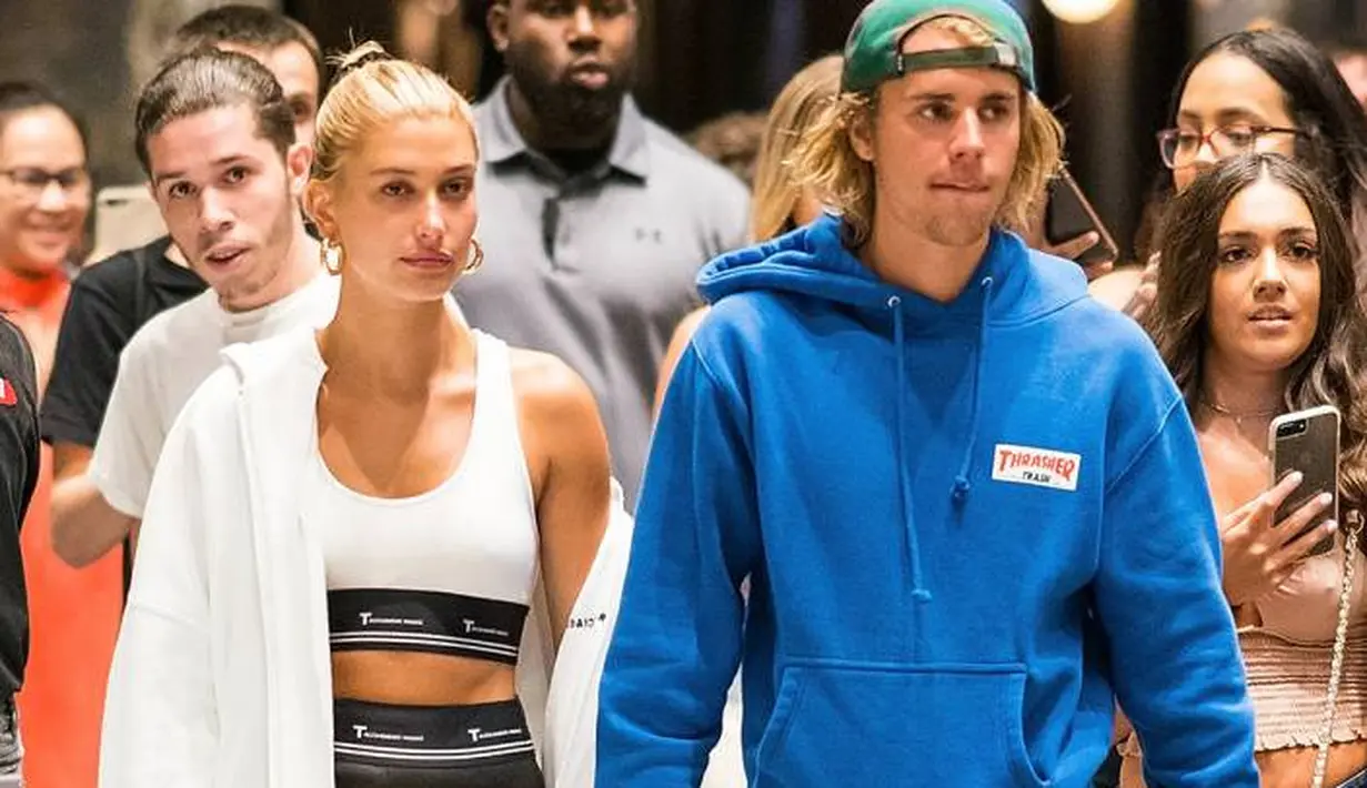 Dilansir dari HollywoodLife, Hailey Baldwin malah mengerti alasan Justin Bieber untuk tetap membiarkan tato tersebut. (Global News)