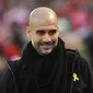 FA berpendapat manajer Manchester City, Pep Guardiola, telah melanggar aturan karena menggunakan pipa kuning sebagai bentuk dukungan kemerdekaan untuk Catalonia yang masalah politik ke dunia sepak bola. (AFP/Oli Scarff)